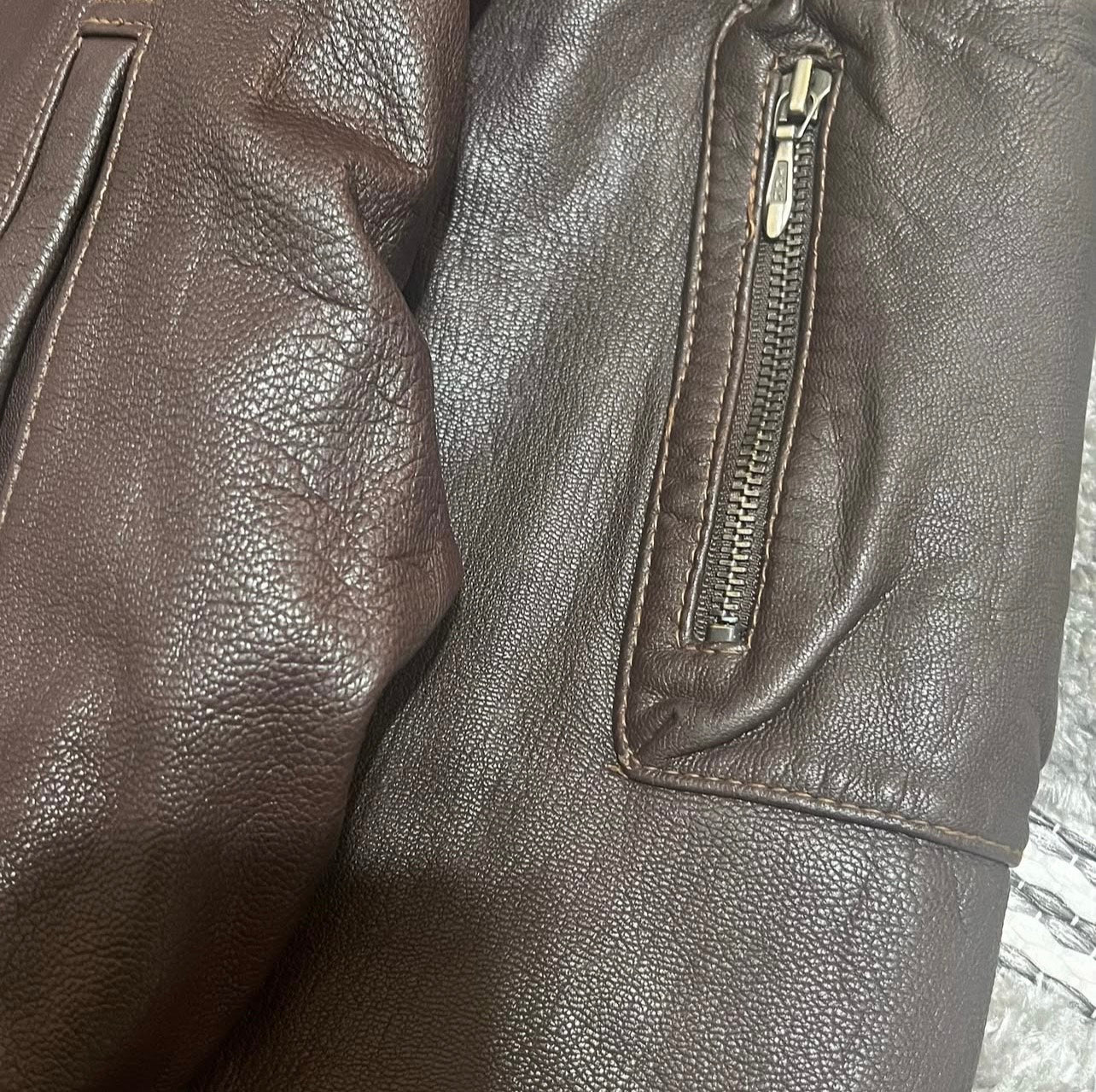 aVintage *heavy* leather jacket **high quality**